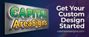 Website header banner for CAPITAL AreaSigns signage company. The design features a dimensional illuminated logo on the left side showing "CAPITAL" in bold green lettering and "AreaSigns" in orange-yellow font, both with black outlines and white backlighting on a brushed metallic panel. To the right, the tagline "Get Your Custom Design Started" is displayed in large white bold text, with "capitalareasigns.com" below it in smaller white text. The background shows a smooth gradient transitioning from deep blue on the left to rich purple on the right, with subtle geometric patterns and light effects. The overall aesthetic is professional, modern, and photorealistic with high-quality commercial photography style. Ultra-realistic rendering with dimensional elements and professional lighting